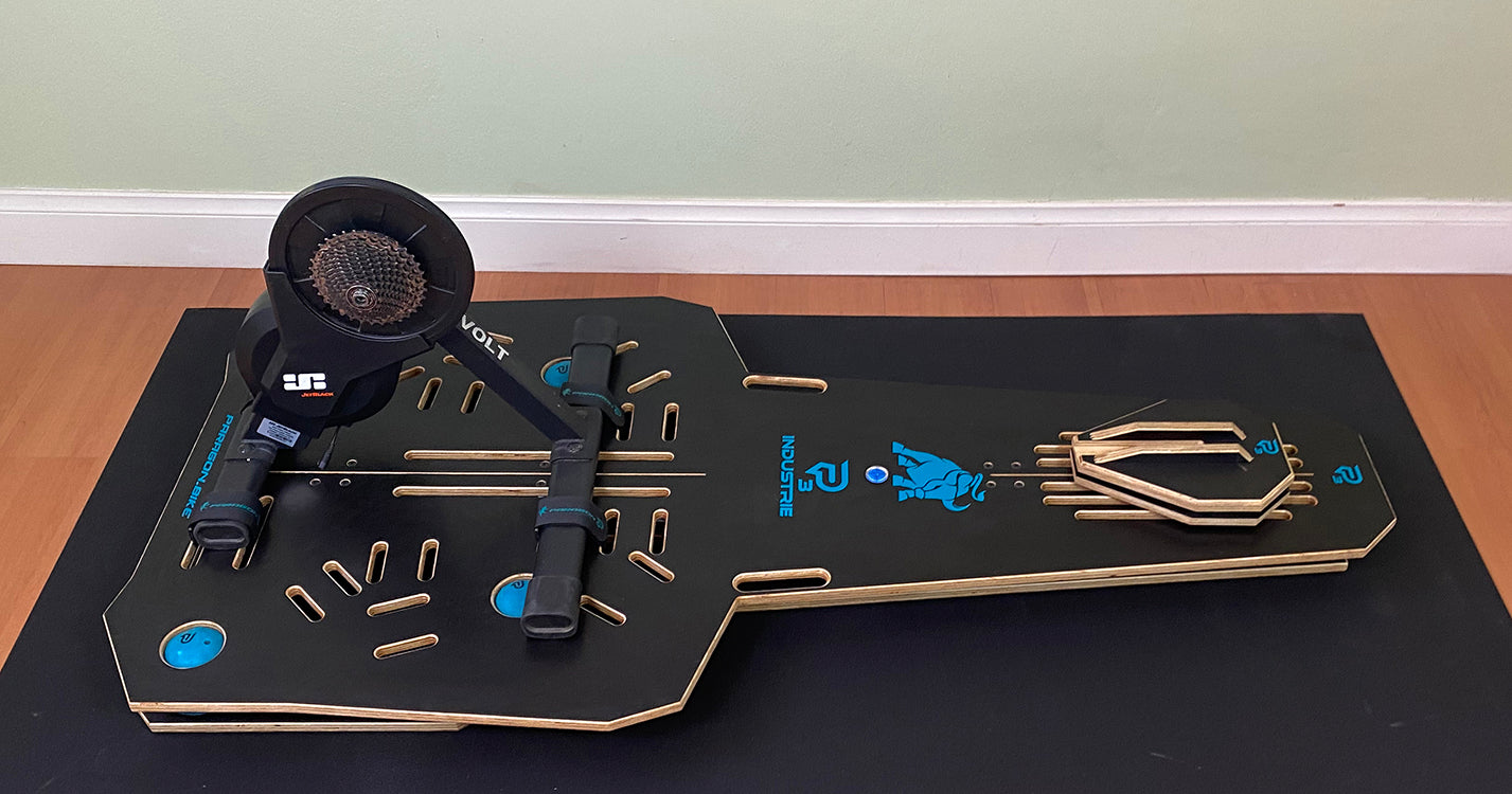 Bike on a JetBlack Volt smart trainer mounted on the Paragon P3 full-motion rocker plate